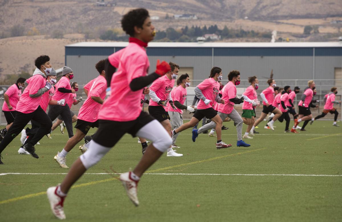 Nearly 100 football players attend Cleats Vs. Cancer minicamp at Sozo